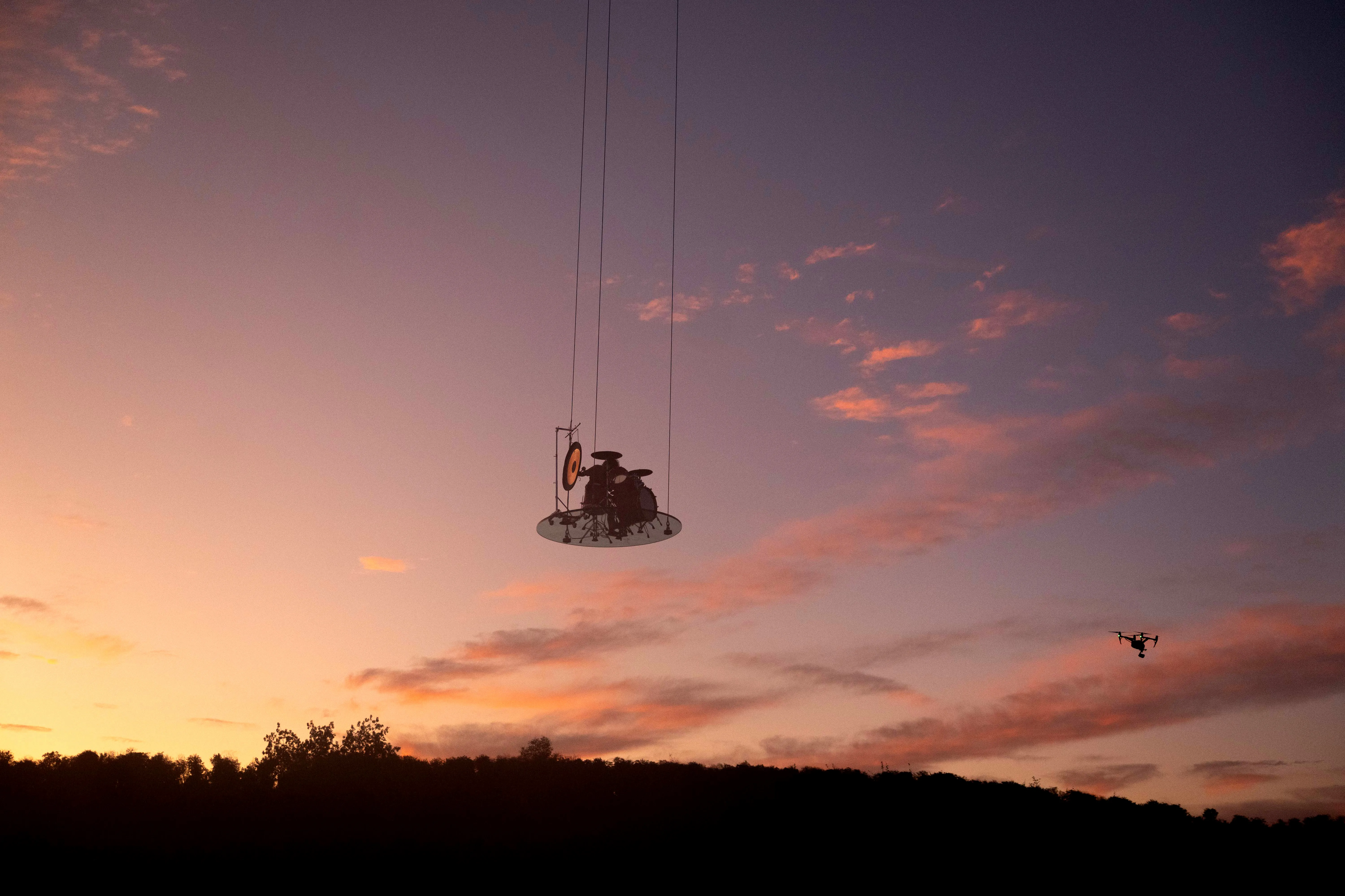 Alejandra Levi performing at sunset, captured simultaneously by aerial drone.